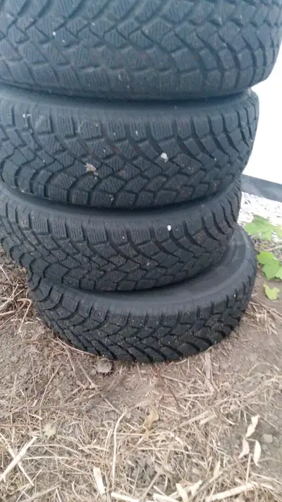 Selling a set of 4 winter tires mounted on rims, originally used on a 2007 Toyota Yaris Hatchback. G...
