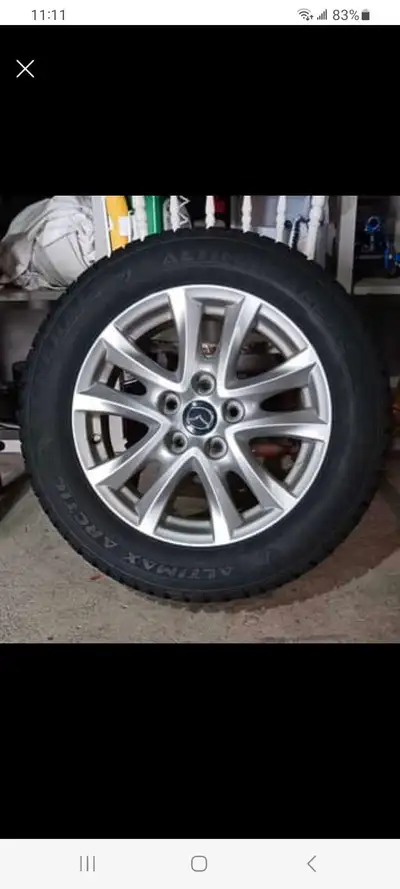Mazda  rims - 16 inch with snow tires