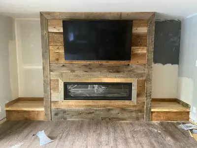 Custom cladded reclaimed wood fireplace surrounds., View more