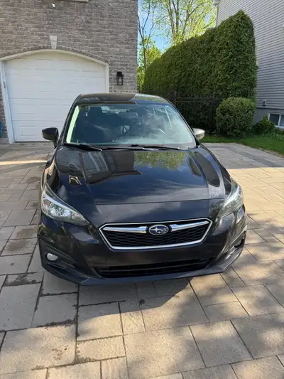 Subaru Impreza 2018 Touring hatchback, 192 000km, automatique. Rigoureusement entretenue (aucun voya...