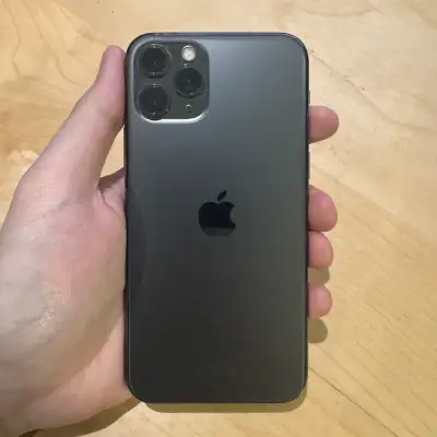 Up for sale is an iPhone 11 Pro 256 GB in Black. Good condition preowned iPhone with a screen protec...