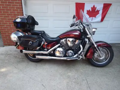 THIS IS A 2008 VTX1800T....TOURER/CRUISER MAROON ON BLACK FACTORY PAINT LOTS OF CHROME FACTORY ALUMI...
