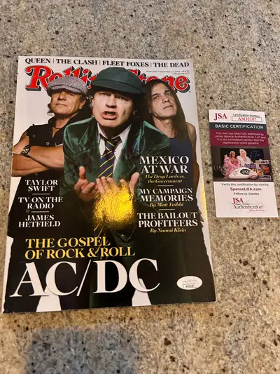 Very nice Angus Young signed magazine with JSA COA. $750 obo