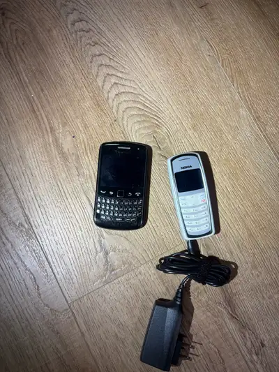Here I have 2 old cell phones One blackberry and one lg. they both work fine