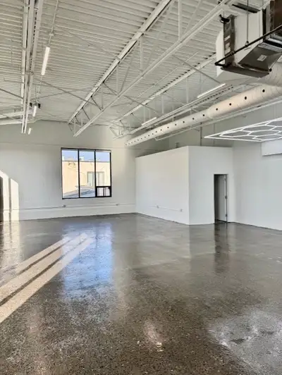 3rd floor corner studio, column free, 13 ft ceiling, 2 pc washroom, HVAC, large industrial windows a...