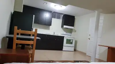 Bachelor/studio basement apartment with some furniture, with separate entrance near Weston Rd & Majo...
