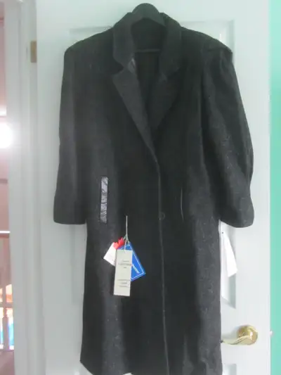New women's full length wool coat - size 11 petite. This fully lined Canadian made coat has leather...