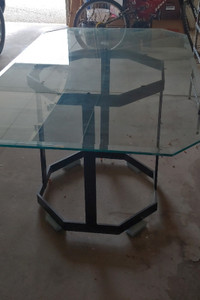 Free for pick up .  Glass table top with pedestal