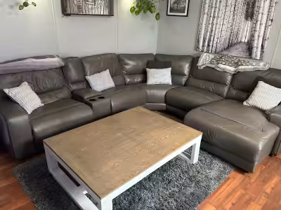 Grey pleather 6 piece sectional 2 recliners 2 cup holders and storage Located in millet $1100 first...