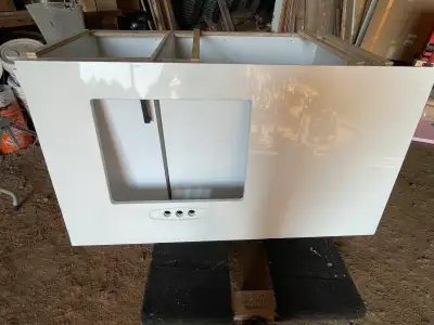 1- 36” sink lower unit and 1- 18” unit with white ceasarstone countertop. Excellent condition $45 ob...
