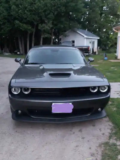 I'm selling my 2021 Dodge Challenger, a sleek coupe with a powerful presence, perfect for cruising a...