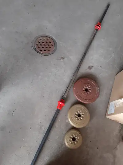 York lifting barbell weight set-- $100 straight bar 1" standard size 9 of 2.5lbs weight plates 7 of...