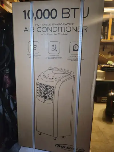 Selling a brand new in the box, Soleus Air 10,000 BTU portable evaporative air conditioner with remo...