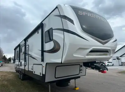 Barely used. Two awnings, two bathrooms, double bunk bunkhouse. Fireplace, lots of kitchen storage.