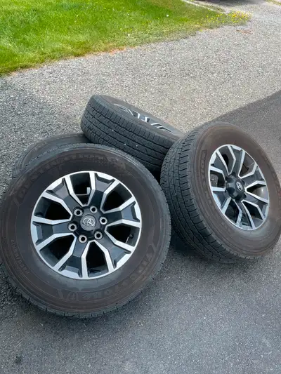 Toyota Rims and Firestone tires in very good condition. The rims are free of any blemishes and look...