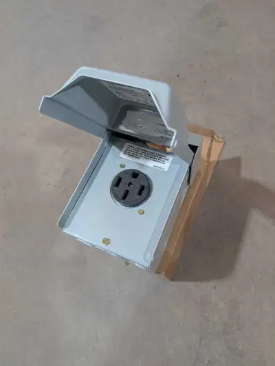 50 Amp weatherproof outlet for RV use, or whatever you'd like. Can mount on a wall or post. New in b...