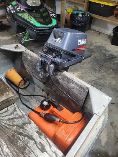 12ft aluminum boat with 6hp Yamaha motor and trailer. Motor runs amazing and was just recently servi...