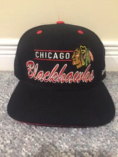 NHL Chicago Blackhawks Reebok Snap Back Hat. Priced at $19.99. Hat has never been worn and tags are...