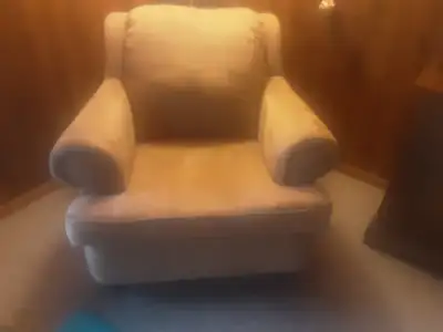 Brown/tan armchair, View more