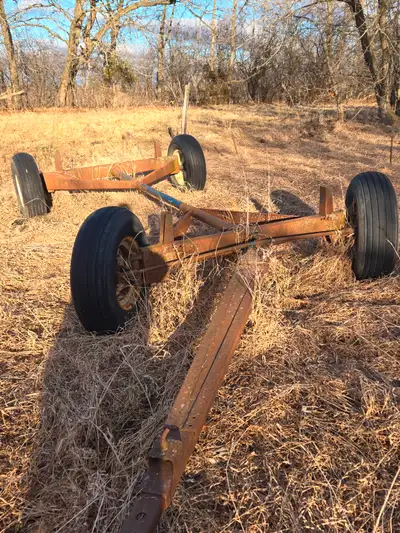 wagon running gear, pulls straight, has good tires. Was originally under a forage box. $1500 or best...