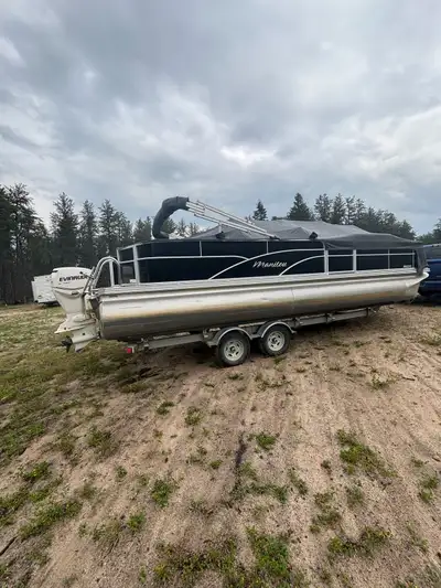 2012 24’ manitou pontoon boat 90hp evinrude 2 stroke engine. Boat has 133 hours, 2 live wells, fish...