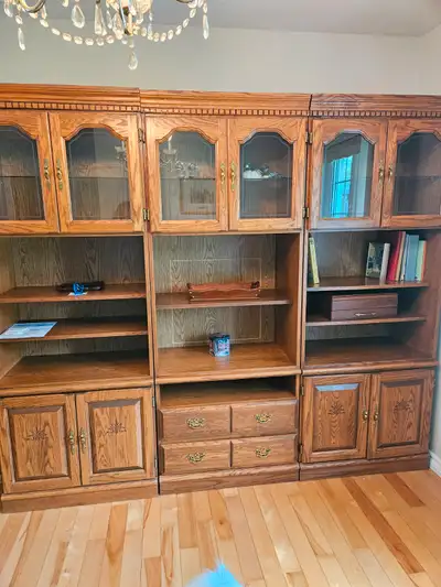 3-piece oak wall unit. Each section is 30" W, 78" H and 16.5" D. Shelves are adjustable. Can be sold...