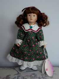 Porcelain December Doll.Clean,SmokeFree, Excellent Cond.onStand