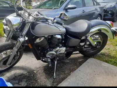 2002 shadow. Great beginner bike. It's a Honda she'll go forever.