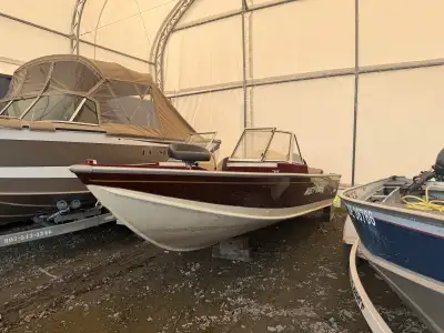 Selling my 19 foot misty river fishing boat ,powered by a evinrude 130hp carburated ,everything work...