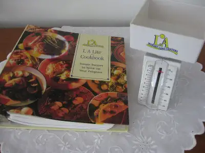 Adjustable mechanical food scale from LA Weight Loss Centers, in excellent condition, scale with foo...