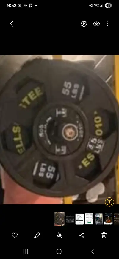 Assorted standard barbell plates and equipment, View more