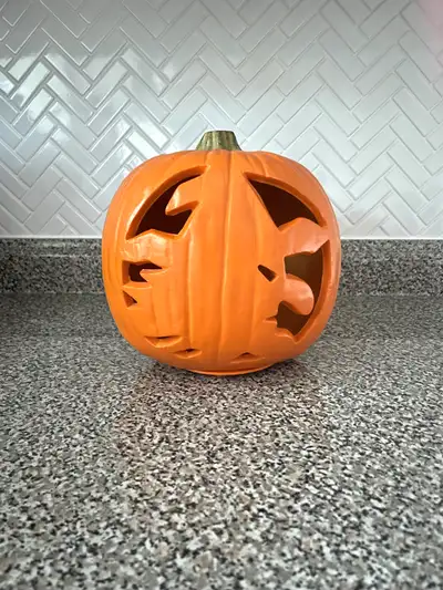 Plug-in witch face jack-o’-lantern with on/off switch, made of hard plastic. About 8.5“ tall and 8.5...
