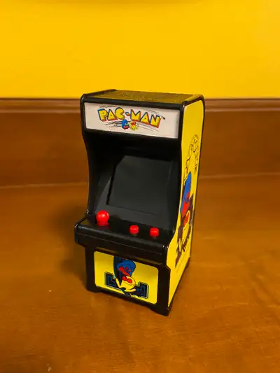 Vintage Tiny Arcade PAC-MAN Keychain w/Original Game Play 3.5". The Tiny Arcade Pac-Man game feature...