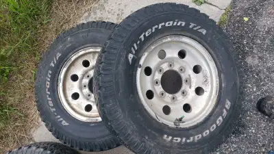 These pre-owned BFGoodrich All-Terrain T/A tires provide reliable traction and rugged durability for...