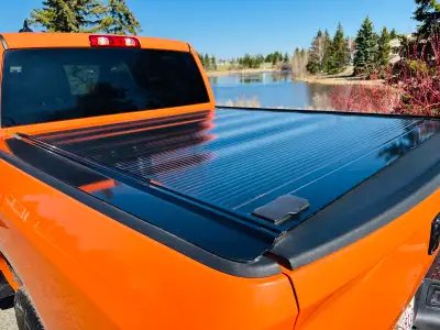 25% of a new one. Nice Retrax tonneau cover for dodge ram short box 5FT 7 INCH. retails for $3,000....