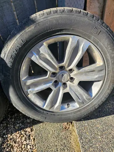 Tires with roughly 50 percent tread on 20 inch ford factory rims. Call or text 780-982-8719 thanks