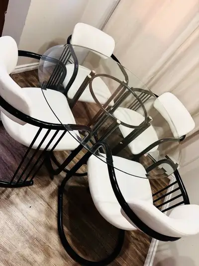 Glass Dinning Table with 4 chairs in a good conditio, View more