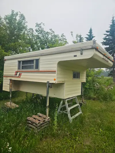 Fabric in good condition.. fridge and stove both work. Floor good.. ceiling needs recovering due to...