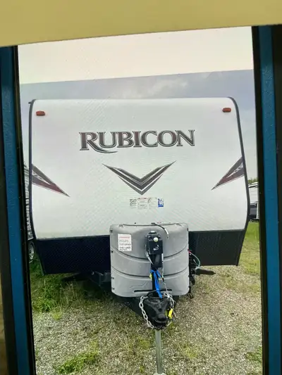 26 ft. Long. 30 amp. Plug. Generator. Underneath 30 gal. gas tank and hose to fill up quad. 3 burner...