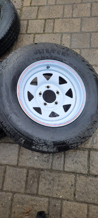 Trailer tire on rim for sale like new st 205 75r14 5 bolt