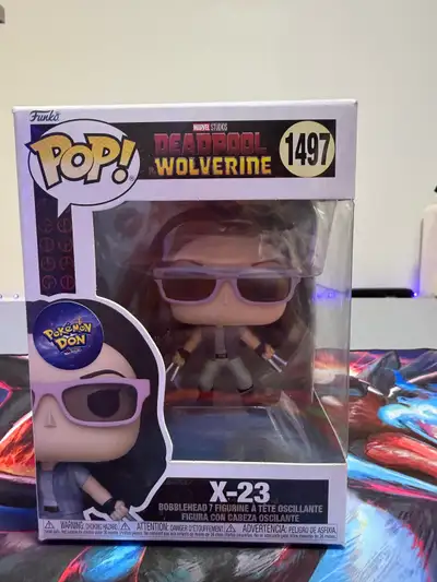I'm selling a Funko Pop! Marvel Studios Deadpool & Wolverine X-23 bobblehead figurine, number 1497....