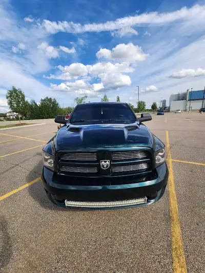 This is a rare factory green 2011 ram 1500 sport crewcab. The body has 358,000km but a new engine wa...
