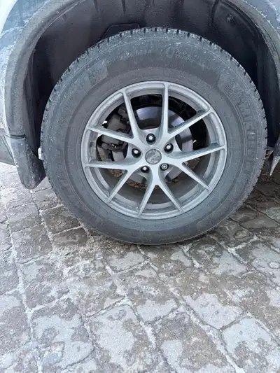 235/65R17 - 4 Michelin X-Ice Snow SUV winter tires with Fast rims