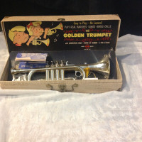 Vintage 1960's golden trumpet toy instrument trompette jouet