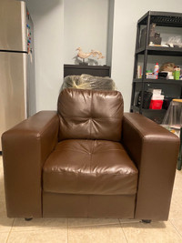 Brown faux leather sofa chair 