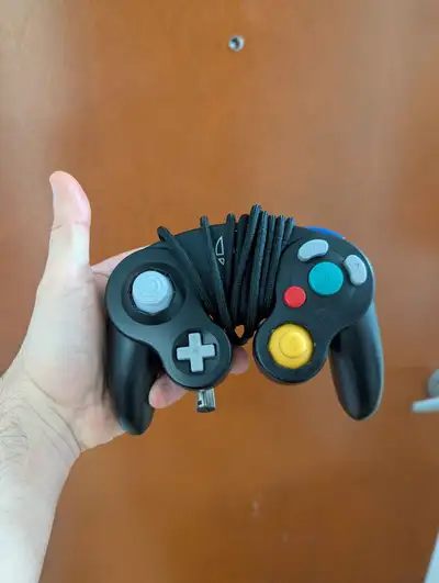 Gamecube Controller Phob with 2.0.5 Motherboard. This controller includes the following mods: - Slic...