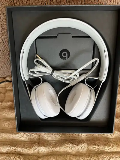white wired Beats headphones, View more