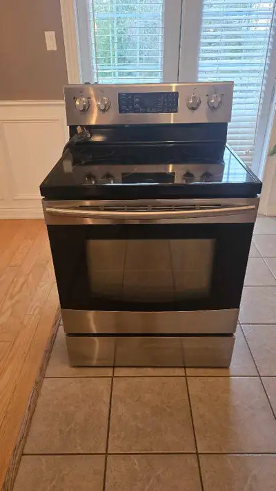 Stove. Stainless and black , View more