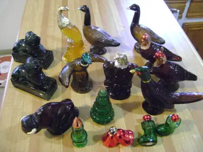 I offer the following Avon bottles for sale: - 2 lion bottles - 1 peacock bottle full of original co...
