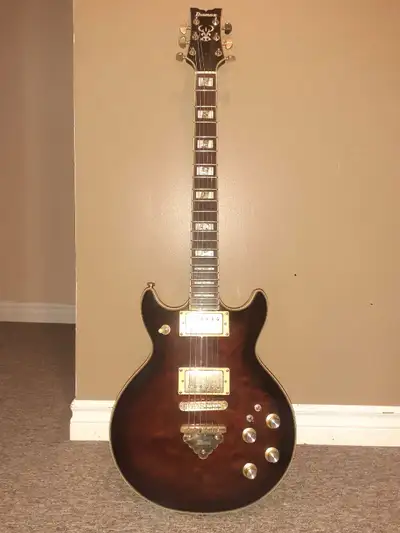 Ibanez AR325 dark brown sunburst. Very good condition. Looks and sounds great!